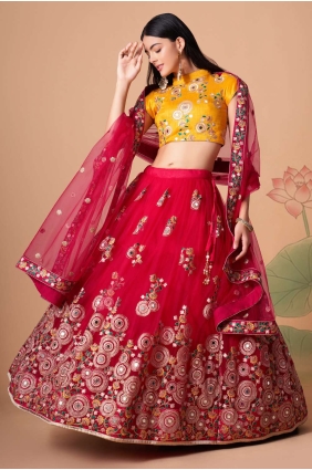 Embroidered Soft net Lehenga Choli in Rani LC6546